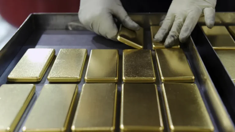 Gold prices fall on firmer dollar